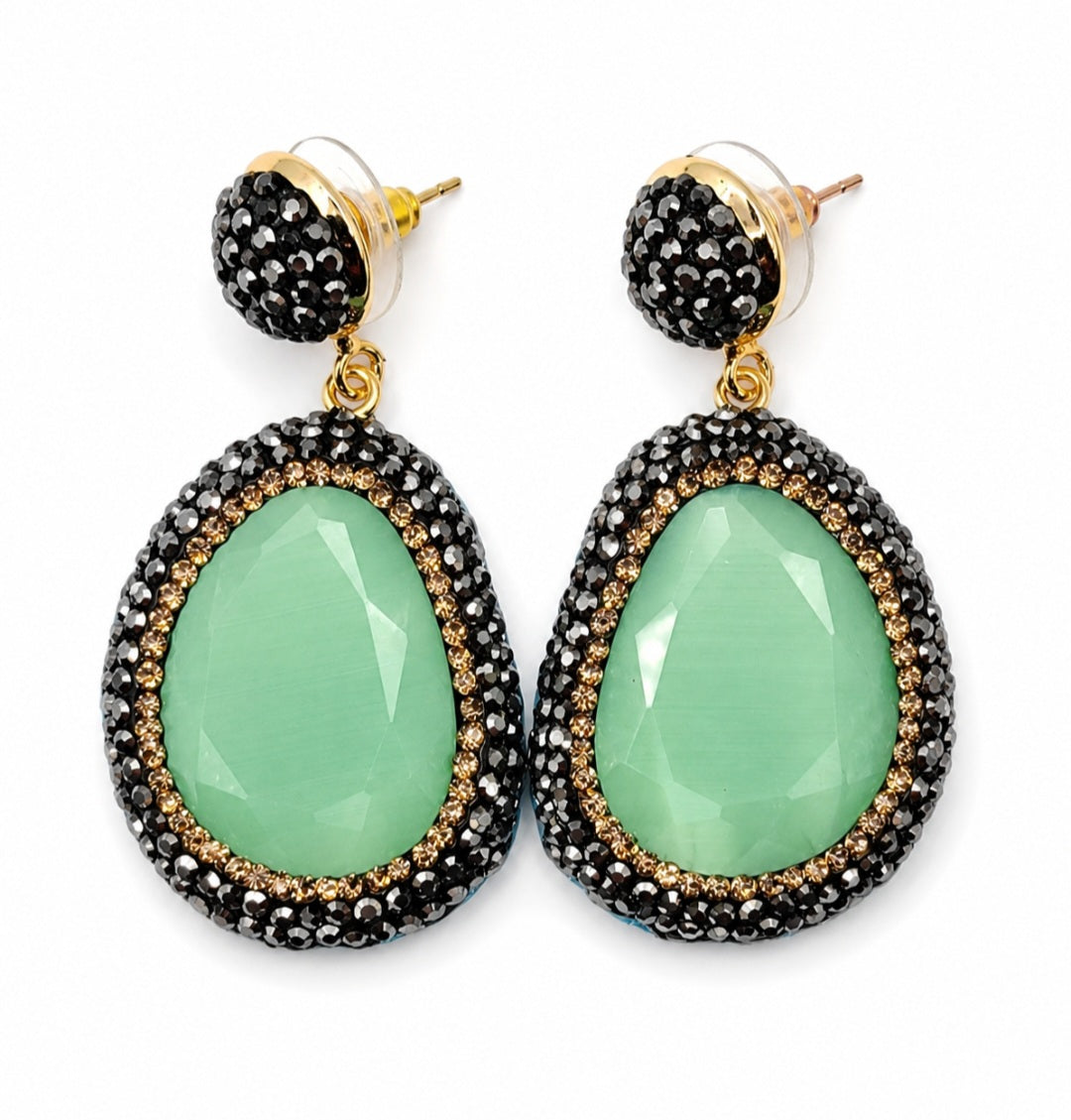 Myra stone pendant earrings in green with black rhinestones, perfect for adding elegance and color to any outfit.