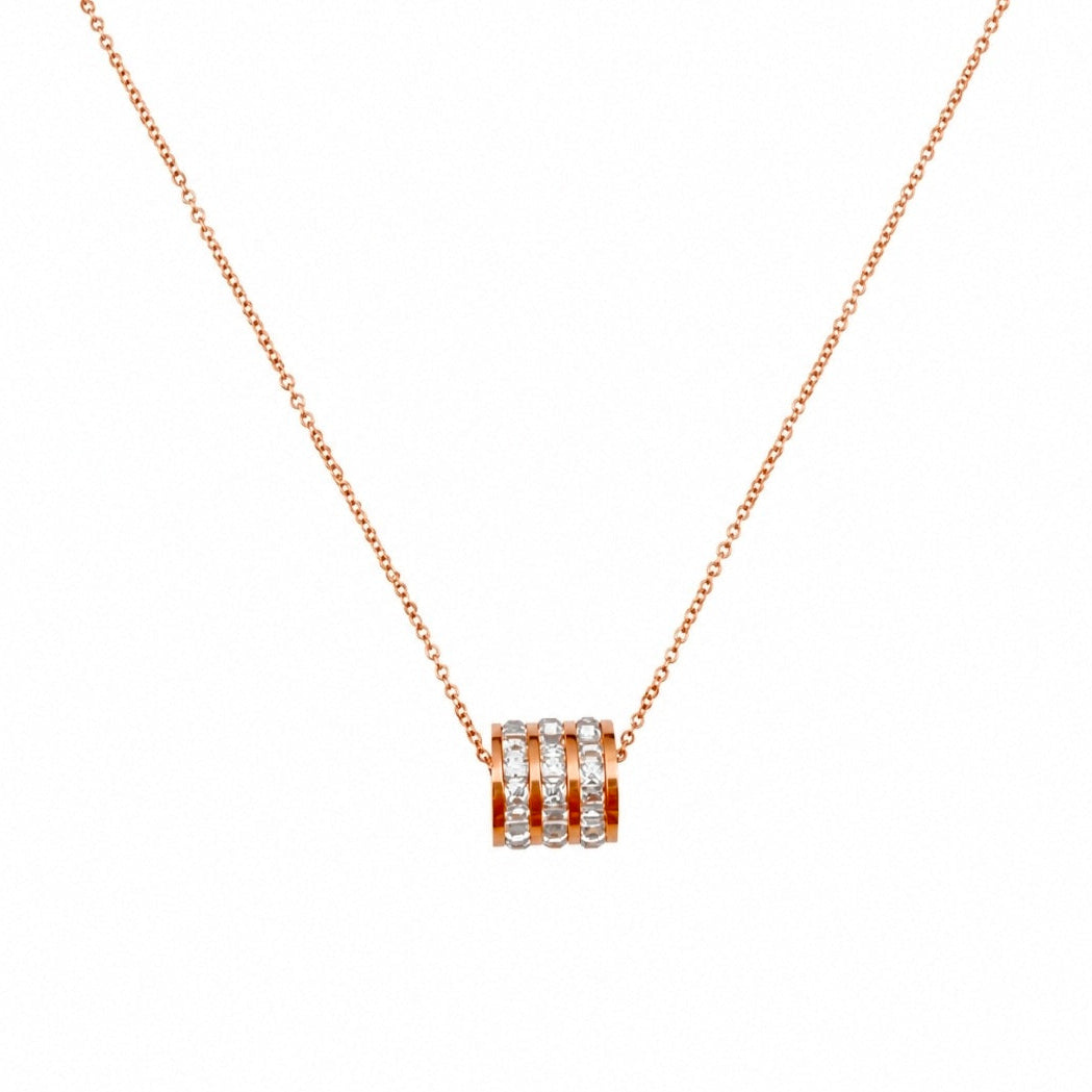 Cubic zirconia pendant necklace with sleek cylindrical design and shimmering stones, featured in the Ariana collection.