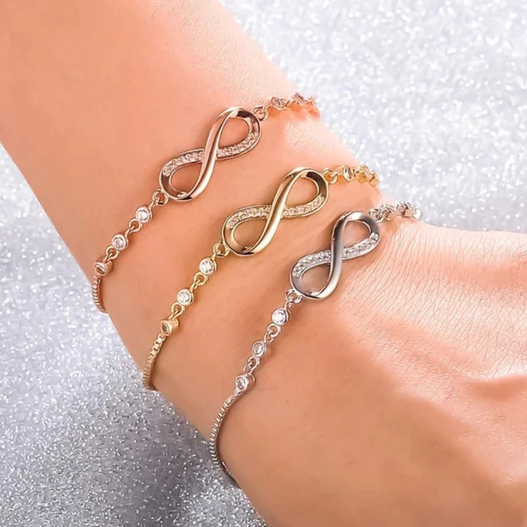 Amna Infinity Bracelet — 18k gold plated stainless steel infinity bracelet with CZ by Zoha Los Angeles