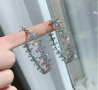 Lora Crystal Flower Hoop Earrings – CZ Floral Statement Hoops in silver | Zoha Los Angeles