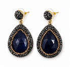 Nisa stone pendant earrings with black rhinestones and gold plating, featuring a teardrop stone design.