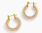 chunky pearl hoop earrings in 18k gold plating with intricate pearl embellishments.