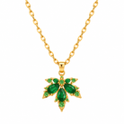 Autumn Glow maple leaf necklace with emerald-green cubic zirconia stones
