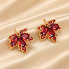 Ruby Cubic Zirconia Maple Leaf Stud Earrings display