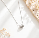 Cubic zirconia pendant necklace - Ariana, featuring a sleek design with shimmering stones and delicate chain.