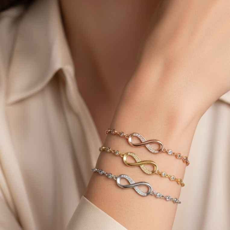 Amna Infinity Bracelet — 18k gold plated stainless steel infinity bracelet with CZ by Zoha Los Angeles