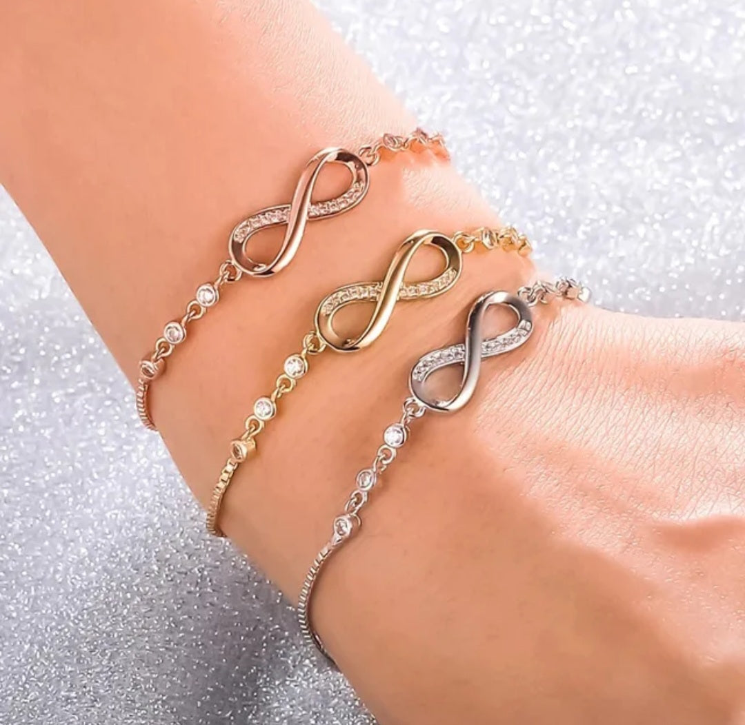 Amna Infinity Bracelet — 18k gold plated stainless steel infinity bracelet with CZ by Zoha Los Angeles