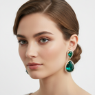 Jena double teardrop halo drop earrings in gold emerald by Zoha Los Angeles