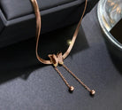 NIDA charm necklace featuring a delicate butterfly pendant on a sleek chain, perfect for elegant styling.
