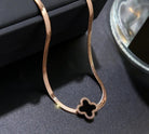 NIDA charm necklace featuring an intricate pendant design in elegant gold-tone, perfect for layering or wearing alone.