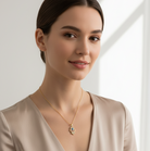 Model wearing a geometric design necklace, showcasing its unique and stylish silhouette.